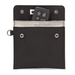 Pacsafe SILENT POCKET FARADAY CAR KEY GUARD - Wertsachenaufbewahrung -Globetrotter Geschäfte 5637737872 c rfidsafe silent pocket car key guard pacsafe 24